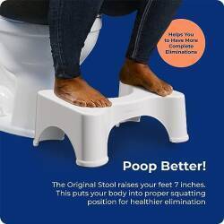 White plastic Squatty Potty poop stool.