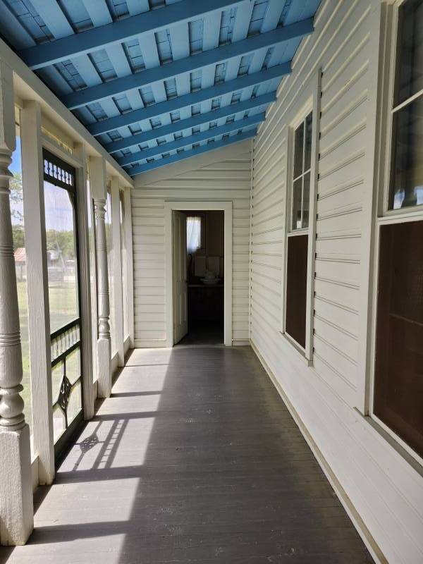 Back porch and door into bathroom at Lyndon Johnson's boyhood home in Johnson City, Texas.