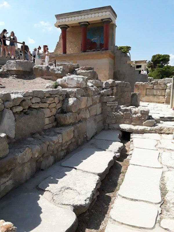 Drain just below Arthur Evans's imaginative reconstructions at the prehistoric site of Knossos, outside Iraklia in Crete.