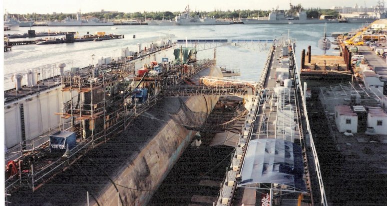 Submarine in a floating drydock at S19 & S20 of Submarine Base Pearl Harbor.