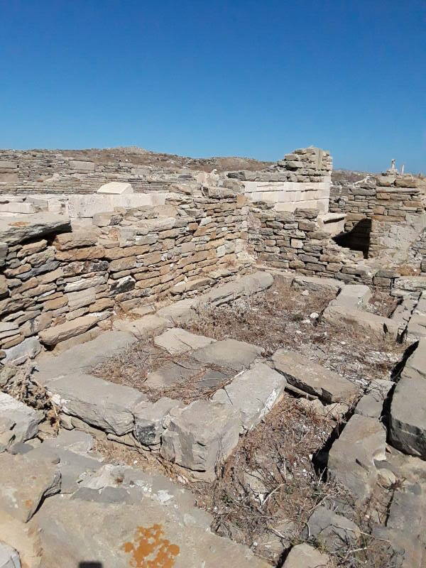 Public latrine along the west side of the Agora of the Italians, next to the Letoön, at Delos.