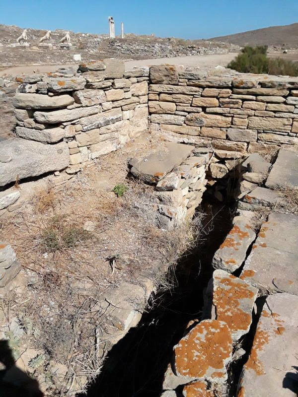 Latrines in the Roman-era public baths at the northwest corner of the Agora of the Italians.