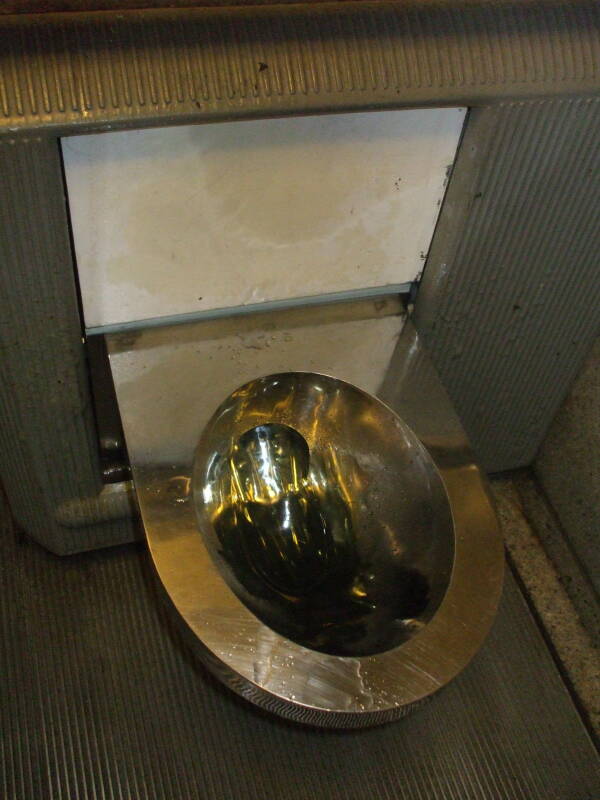 Steel toilet inside a French-style automated toilet in San Francisco.