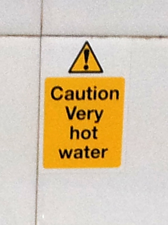 Typical British warning label about unusually hot water.