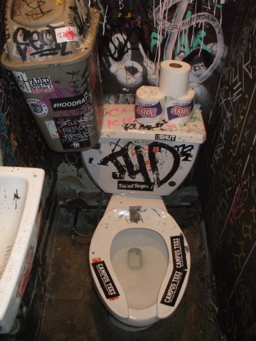 Toilet in Welcome To The Johnson's Bar on Rivington Street on the Lower East Side in New York.