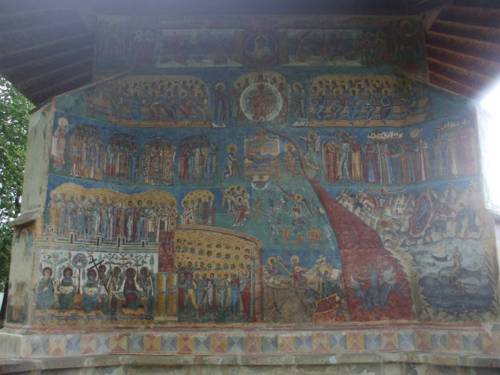 Last Judgement on the porch of one of the Painted Churches of Bucovina, Romania.