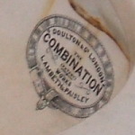 19th century Scottish porcelain toilet labeled 'Doulton of London, the Combination, Works Lambeth and Paisley'.
