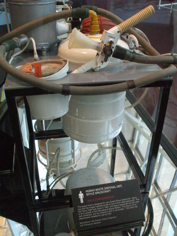 Soviet or Russian Soyuz spacecraft toilet configured for male use.