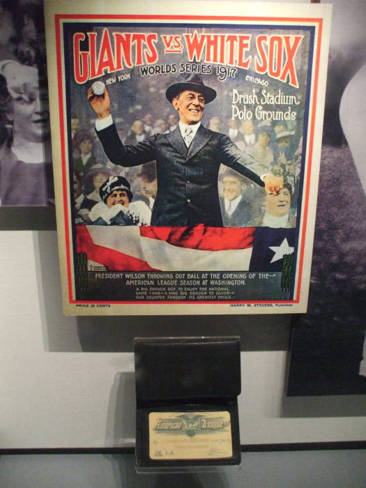 Poster of Woodrow Wilson throwing out the first baseball in the World Series, and Woodrow Wilson's annual pass to the American League.